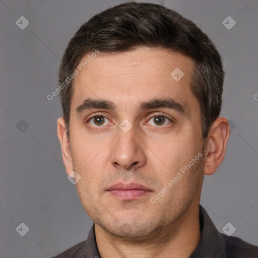 Neutral white adult male with short  brown hair and brown eyes