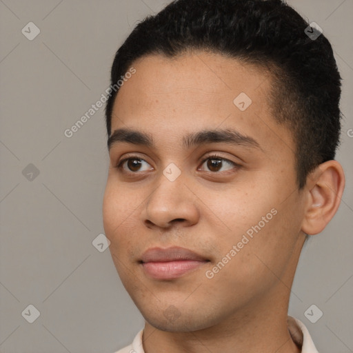 Joyful white young-adult male with short  black hair and brown eyes