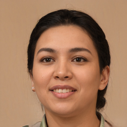 Joyful white young-adult female with medium  brown hair and brown eyes