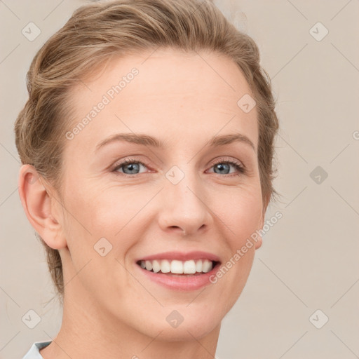 Joyful white young-adult female with medium  brown hair and blue eyes