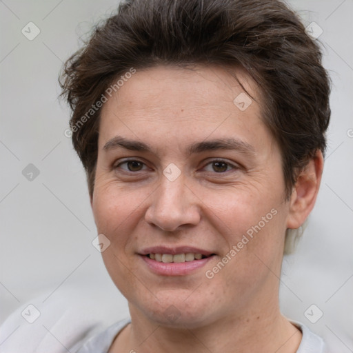 Joyful white adult female with short  brown hair and brown eyes