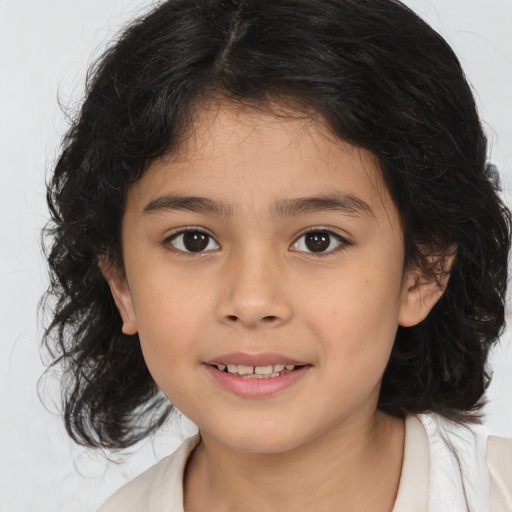 Joyful white child female with medium  brown hair and brown eyes