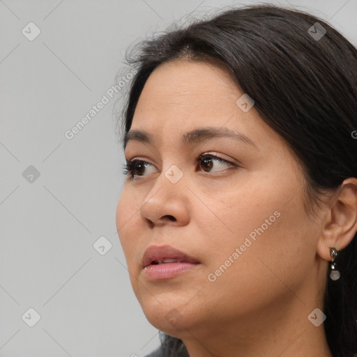 Neutral white young-adult female with long  brown hair and brown eyes