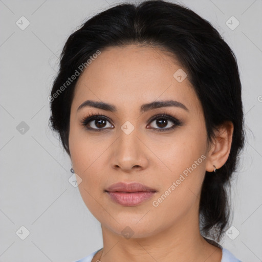 Joyful asian young-adult female with medium  black hair and brown eyes