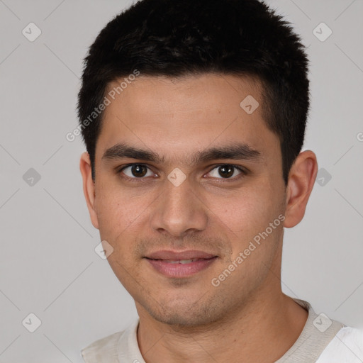 Joyful white young-adult male with short  black hair and brown eyes