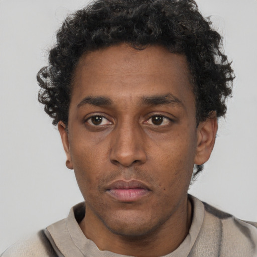 Neutral latino young-adult male with short  brown hair and brown eyes