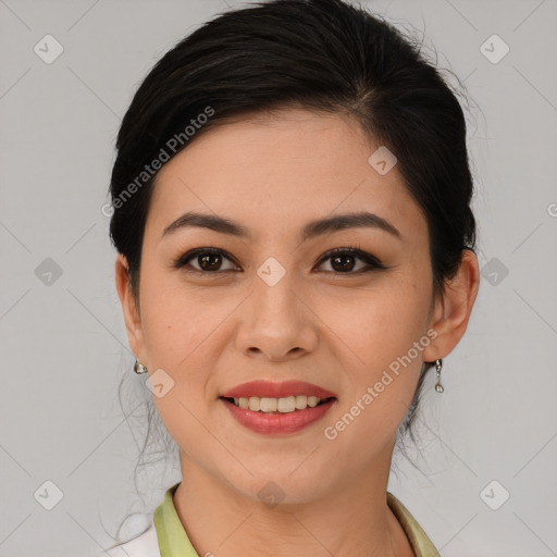 Joyful latino young-adult female with medium  brown hair and brown eyes