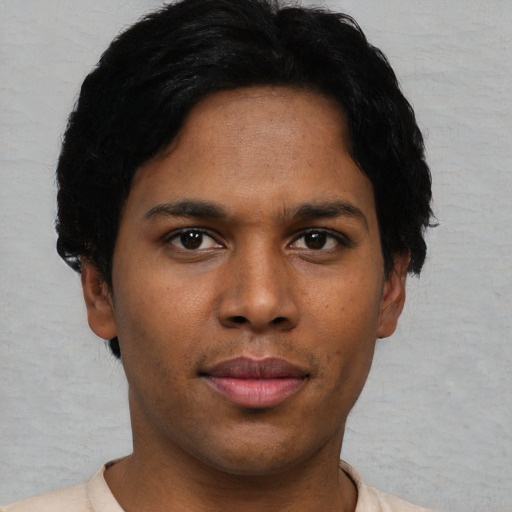 Neutral black young-adult male with short  black hair and brown eyes