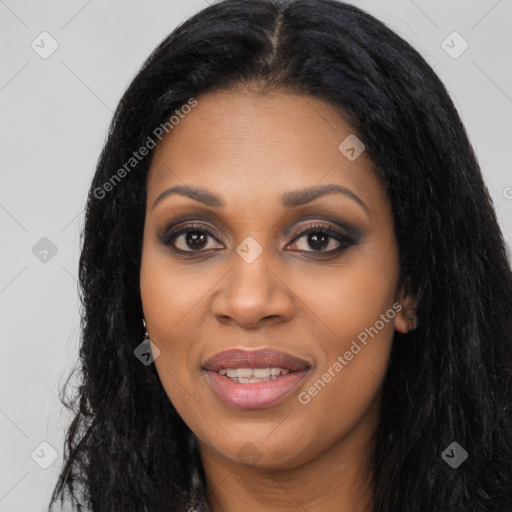 Joyful latino young-adult female with long  black hair and brown eyes