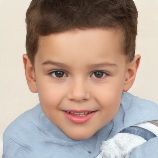 Joyful white child male with short  brown hair and brown eyes