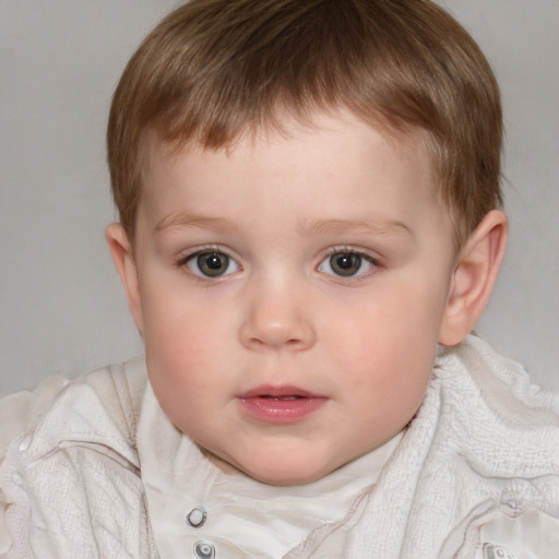 Neutral white child male with short  brown hair and blue eyes