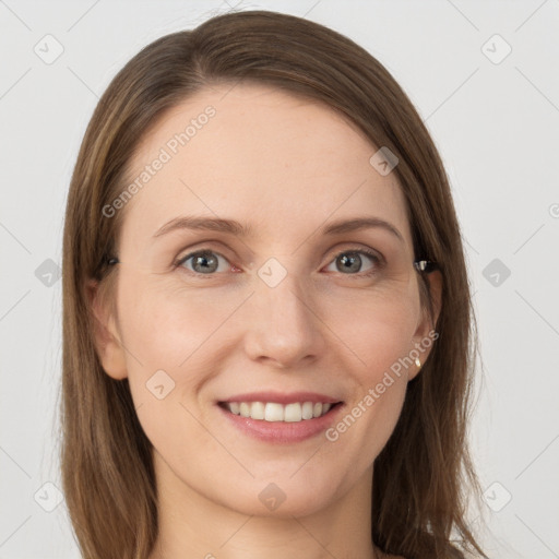 Joyful white young-adult female with long  brown hair and grey eyes