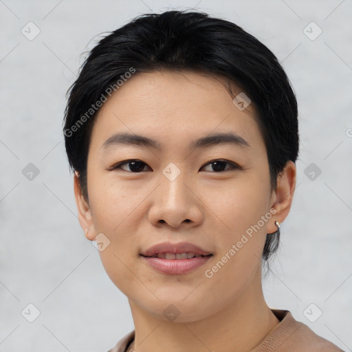 Joyful asian young-adult female with short  black hair and brown eyes