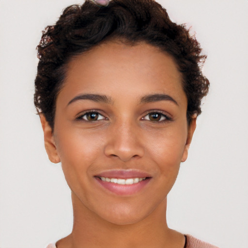 Joyful white young-adult female with short  black hair and brown eyes