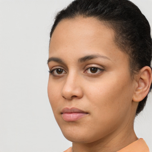 Neutral latino young-adult female with short  brown hair and brown eyes