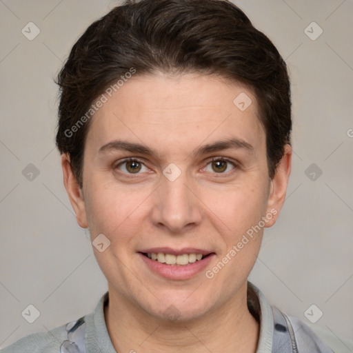 Joyful white young-adult female with short  brown hair and grey eyes