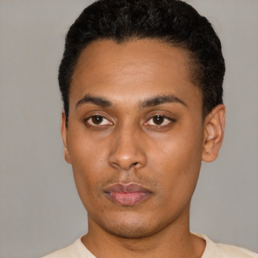 Neutral latino young-adult male with short  black hair and brown eyes