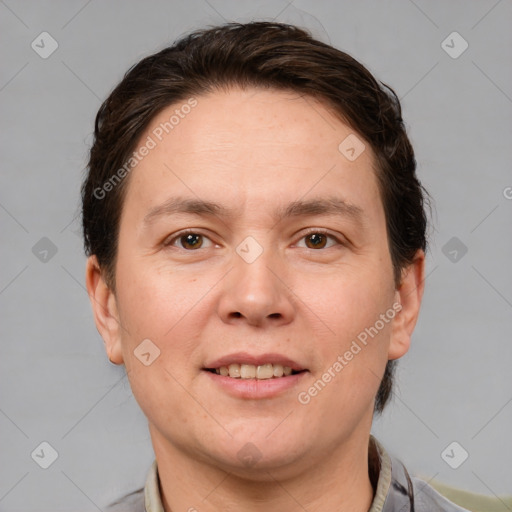 Joyful white adult female with short  brown hair and brown eyes