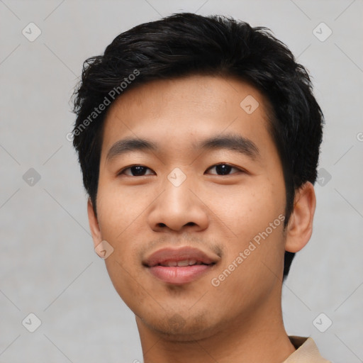 Joyful asian young-adult male with short  black hair and brown eyes