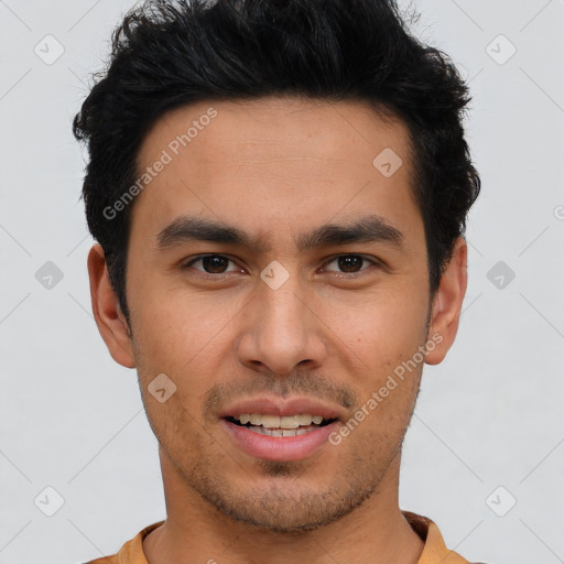 Joyful asian young-adult male with short  brown hair and brown eyes