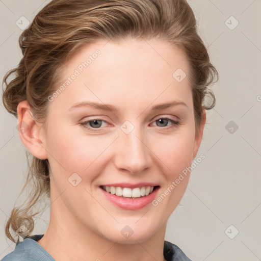 Joyful white young-adult female with medium  brown hair and blue eyes