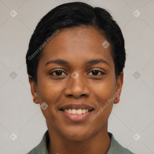 Joyful black young-adult female with short  black hair and brown eyes