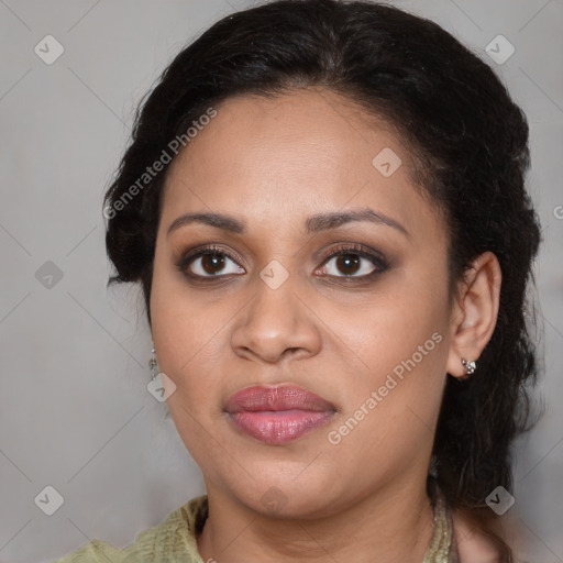 Joyful latino young-adult female with medium  brown hair and brown eyes