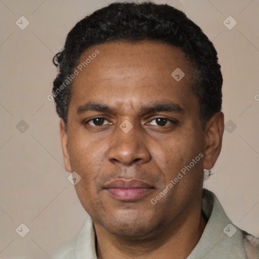Neutral black adult male with short  black hair and brown eyes