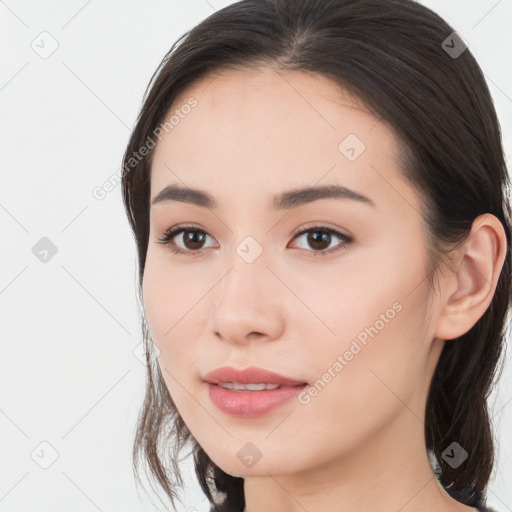 Neutral white young-adult female with long  brown hair and brown eyes