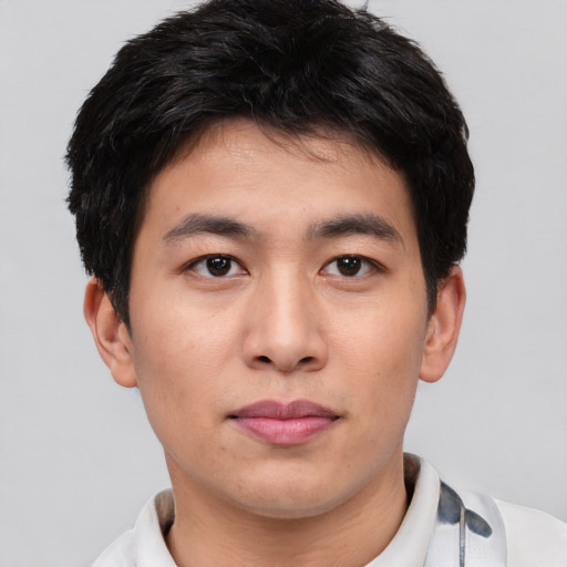Neutral asian young-adult male with short  black hair and brown eyes