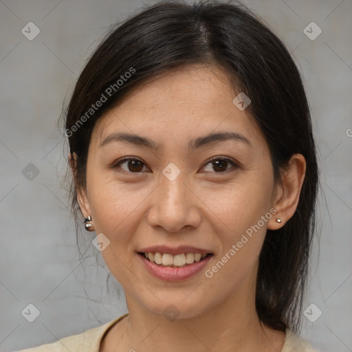 Joyful latino young-adult female with medium  brown hair and brown eyes