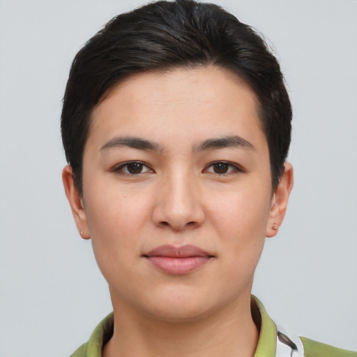 Joyful asian young-adult female with short  black hair and brown eyes