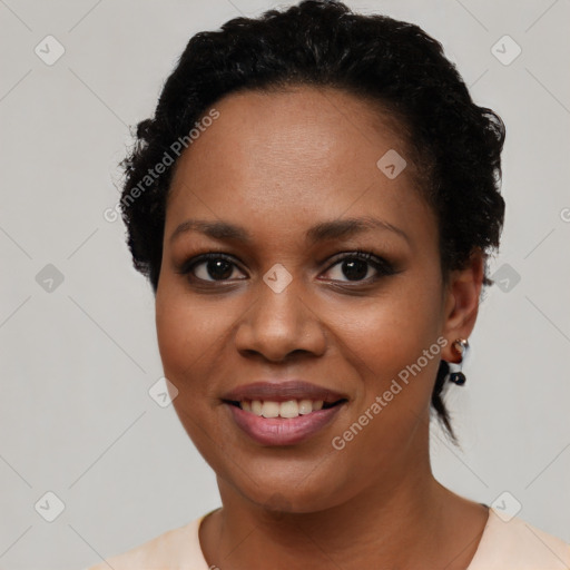 Joyful latino young-adult female with short  black hair and brown eyes