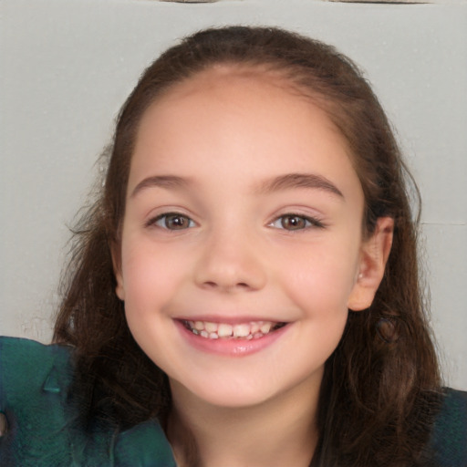 Joyful white child female with long  brown hair and brown eyes