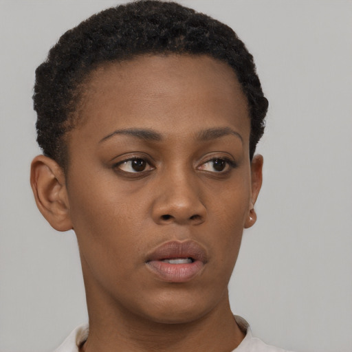 Neutral black young-adult female with short  brown hair and brown eyes