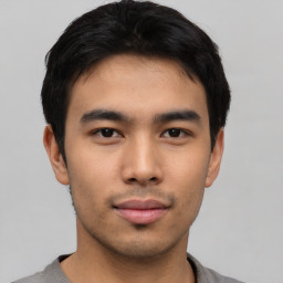 Neutral asian young-adult male with short  black hair and brown eyes