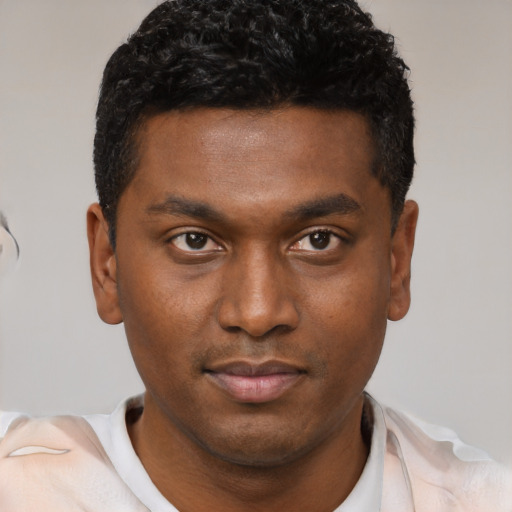 Neutral black young-adult male with short  black hair and brown eyes