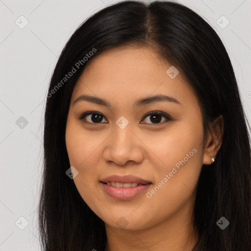 Joyful latino young-adult female with long  brown hair and brown eyes