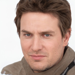 Joyful white adult male with short  brown hair and grey eyes