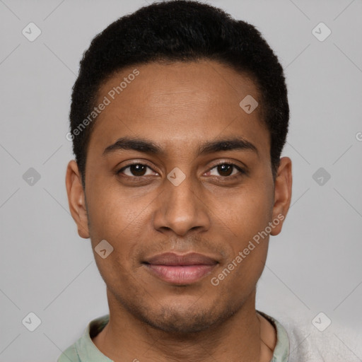 Joyful black young-adult male with short  brown hair and brown eyes