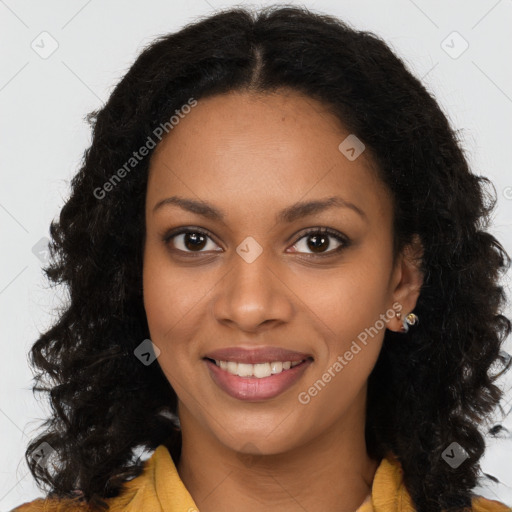 Joyful black young-adult female with long  brown hair and brown eyes