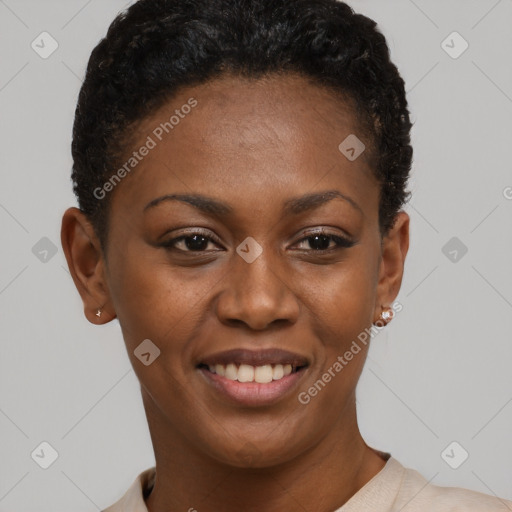 Joyful black young-adult female with short  brown hair and brown eyes