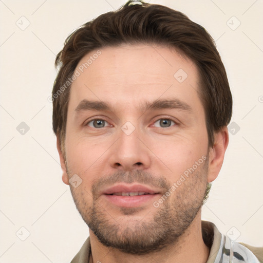 Joyful white young-adult male with short  brown hair and brown eyes