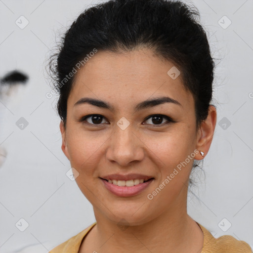 Joyful latino young-adult female with short  brown hair and brown eyes