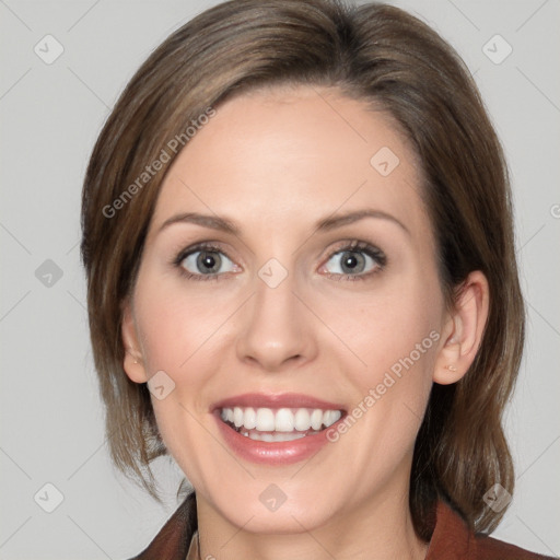 Joyful white young-adult female with medium  brown hair and blue eyes