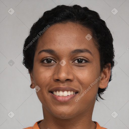 Joyful latino young-adult female with short  black hair and brown eyes