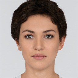 Neutral white young-adult female with short  brown hair and brown eyes