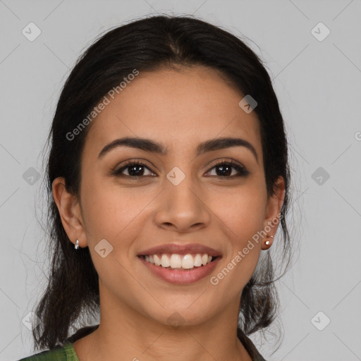 Joyful latino young-adult female with medium  brown hair and brown eyes