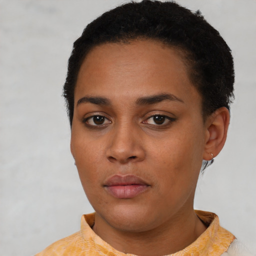 Neutral latino young-adult female with short  black hair and brown eyes