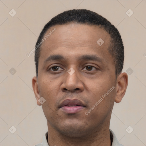 Neutral latino young-adult male with short  black hair and brown eyes